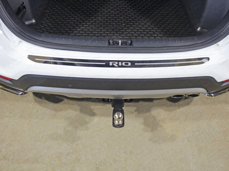 KIA Rio X-Line 2017-2020 Накладка на задний бампер (лист зеркальный надпись RIO) Обвес для KIA Rio X-Line 2017-2020 Накладка на задний бампер (лист зеркальный надпись RIO)